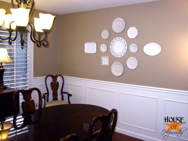 How to make a big statement on an even bigger blank wall; decorating with plates.