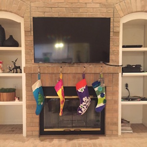 Mounting a TV on brick above a fireplace